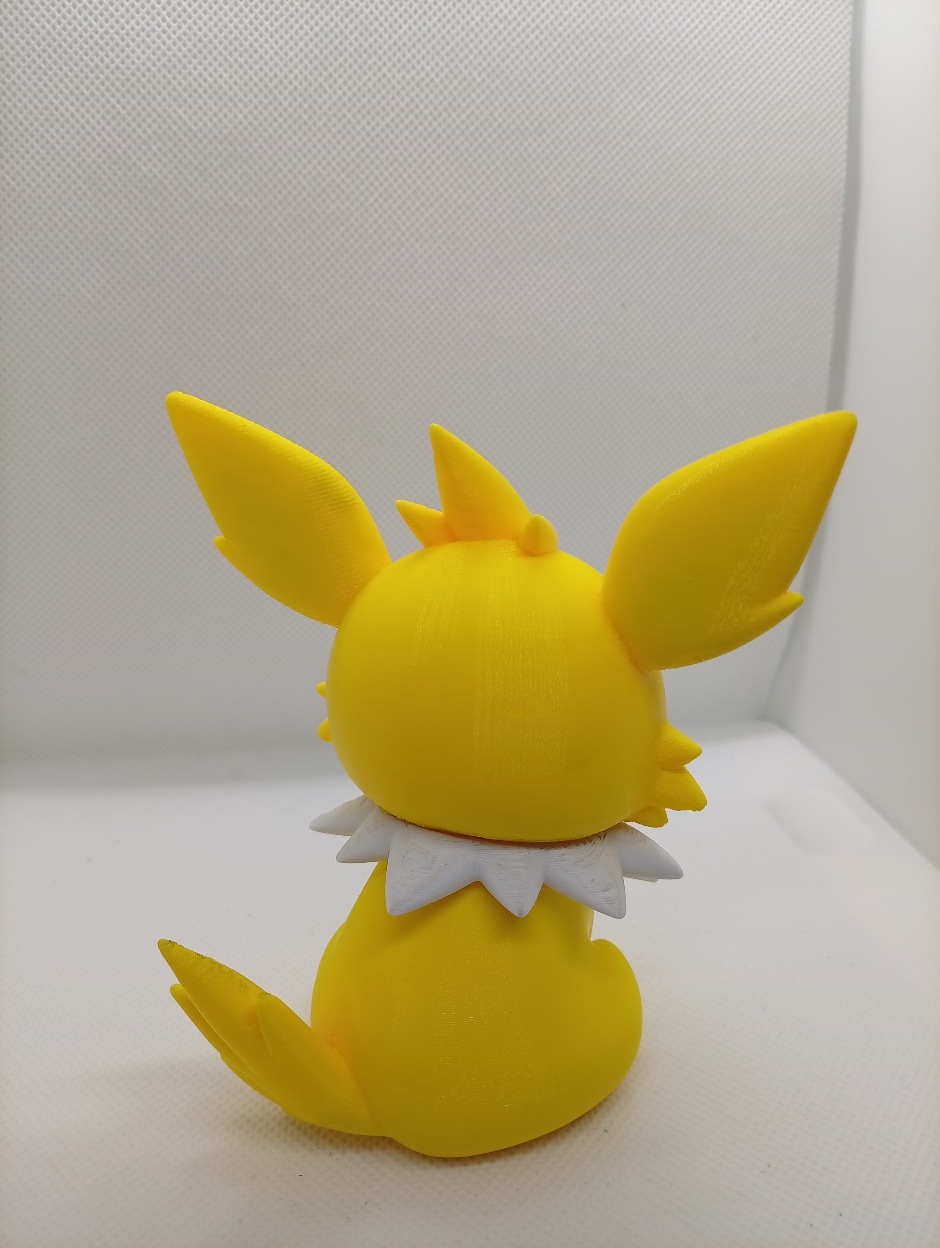 Miniatura Jolteon - costas